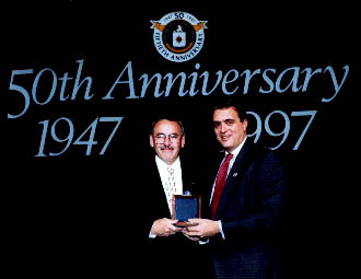 CIA Trailblazer Award (Antonio and George Tenet)

…I am very pleased to inform you that you have been selected as a “CIA Trailblazer” in this, our 50th anniversary year…Nominees were limited to those individuals – of any grade, in any field, and at any point in CIA’s history – who distinguished themselves as leaders, made a real difference in CIA’s pursuit of its mission, and who served as a standard of excellence for others to follow. …I hope you will accept this award as an expression of thanks from a grateful nation…

From George J. Tenet

The Director of Central Intelligence…